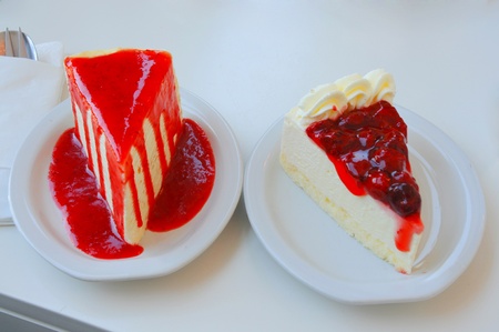 Strawberry cheesecake and straberry crape cake slicesの写真素材