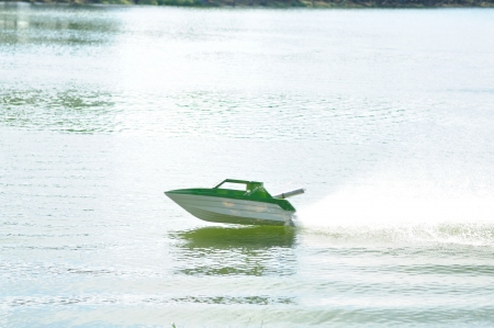 Remote-controlled speedboat の写真素材