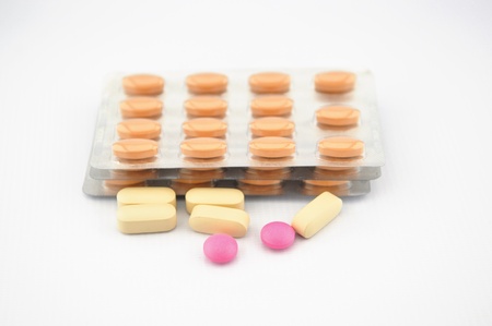 Tablet and blister pack show medicine background