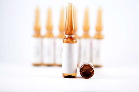 Brown injection ampule show medicine background