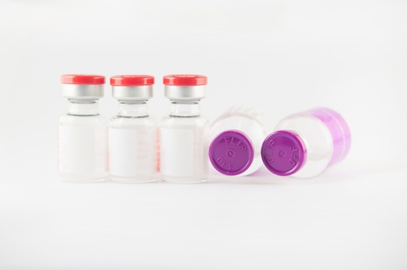 Red and purple cap injection vial show medicine background