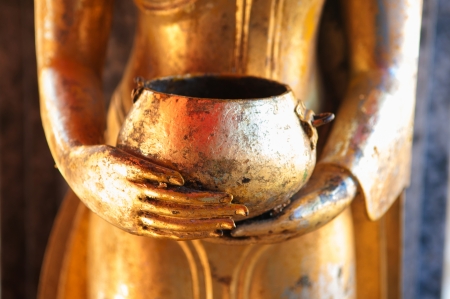 Closed up Buddha and bowl at Doi Suthep in Chiangmai Thailandの写真素材