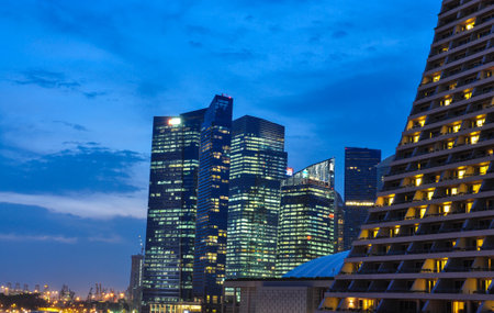 SINGAPORE - AUGUST 21: Night view business building from Marina bay resort on August 21, 2013 in Singapore.Building business around marina bay.のeditorial素材