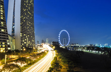 SINGAPORE -AUGUST 21: Night view of Singapore city skyline on AUGUST 21, 2013 in Singapore.Singapore city skyline at night のeditorial素材