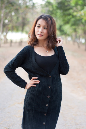 Fashion asian woman in gardenの写真素材