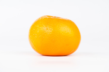 Orange fruit on white background