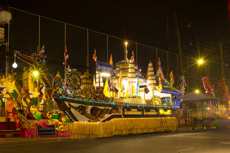 SURATTHANI, THAILAND - OCTOBER 27 : Barge is decorated on parades in Chak Phra Festival on October 27, 2015 in Suratthani, Thailand. Chak Phra is the traditional of buddhist festival in Suratthani.のeditorial素材