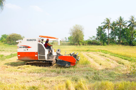 Nong Khai, Thailand- APRIL 20,2016: Rice harvester tractor in Nong Khai,Thailand  April 20, 2016のeditorial素材
