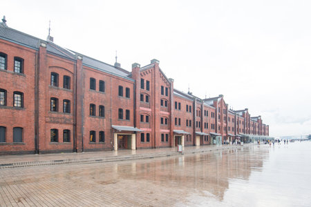 YOKOHAMA, JAPAN - NOVEMBER 6, 2018:People visit Yokohama Red brick Warehouse after rain fall, historical building that is used as a shopping mall and event.のeditorial素材