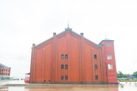 YOKOHAMA, JAPAN - NOVEMBER 6, 2018:Yokohama Red brick Warehouse after rain fall, historical building that is used as a shopping mall and event.のeditorial素材