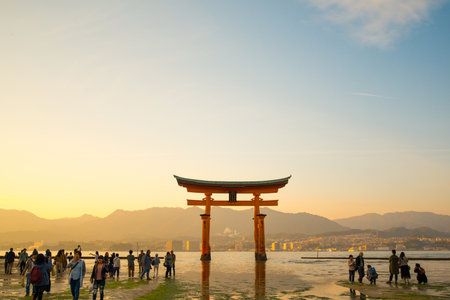 HIROSHIMA JAPAN - November 11, 2018 : Tourist to see Floating torii gate and pray of Itsukushima Shrine at Miyajima island Hiroshima, Japanのeditorial素材