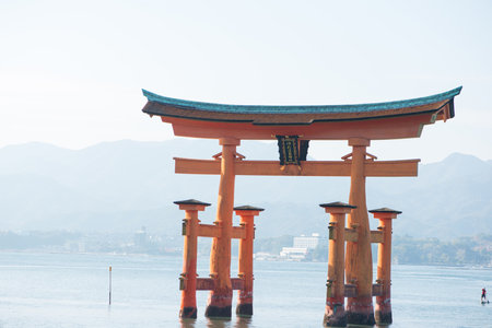 Floating torii gate of Itsukushima Shrine at Miyajima island Hiroshima, Japan. Japanese characters mean "itsukushima shrine"のeditorial素材