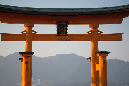 Floating torii gate of Itsukushima Shrine at Miyajima island Hiroshima, Japan. Japanese characters mean "itsukushima shrine"のeditorial素材