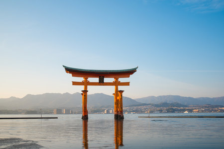 Floating torii gate of Itsukushima Shrine at Miyajima island Hiroshima, Japan. Japanese characters mean "itsukushima shrine"のeditorial素材