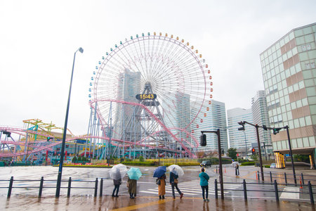 YOKOHAMA, JAPAN - November 06, 2018: Giant ferris wheel of amusement park Yokohama Cosmo World in Yokohama, Japan.のeditorial素材