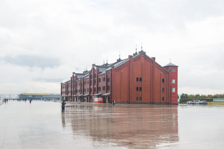 YOKOHAMA, JAPAN - NOVEMBER 6, 2018:People visit Yokohama Red brick Warehouse after rain fall, historical building that is used as a shopping mall and event.のeditorial素材