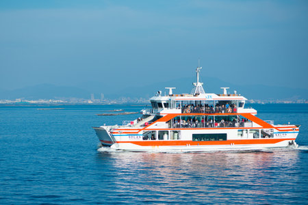HIROSHIMA JAPAN - November 11, 2018 : Miyajima maru ferries crossing the inland sea between Miyajimaguchi and Miyajima at Hiroshima,Japanのeditorial素材
