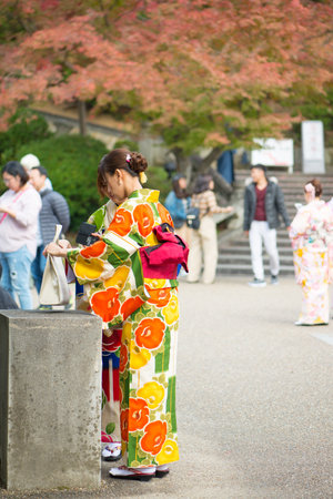 Kyoto, Japan - November 12, 2018:Japanese girl in kimono dress at Kiyomizu temple  in Kyoto, Japanのeditorial素材