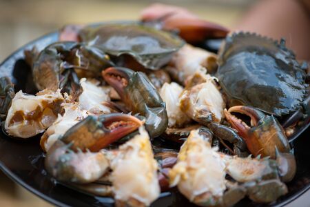 Black crab steep fish sauce and eat with spicy sauce,The favorite food in Thailand