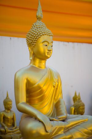 Gold Buddha in Wat Phra That Bang Phuan in Nongkhai of Thailandの写真素材