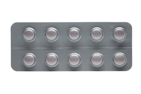 Closed up blister pack of medicine on whiteの写真素材