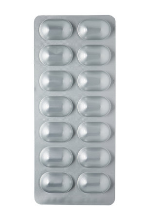Closed up blister pack of medicine on whiteの写真素材