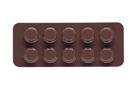 Closed up brown blister pack of medicine on whiteの写真素材