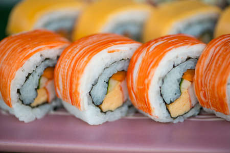 Closed up japanese sushi Maki and rolls show food backgroundの写真素材