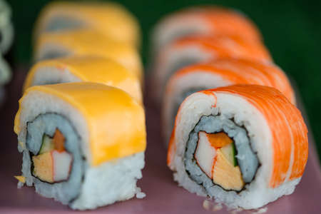 Closed up japanese sushi Maki and rolls show food backgroundの写真素材