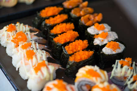 Japanese sushi Maki and rolls show food backgroundの写真素材
