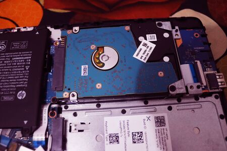 Laptop All Parts when uncover.Laptop Battery,Processor,Hard disk,Ram and Fan.Computer...