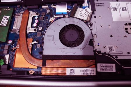 Laptop All Parts when uncover.Laptop Battery,Processor,Hard disk,Ram and Fan.Computer repair.Electronic service center.Technician support upgrade part and fixing laptop.の写真素材