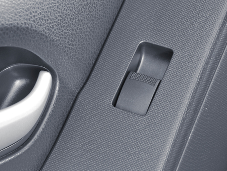 buttons controlling the windows in a car