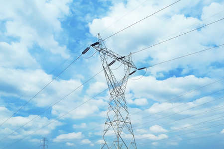 electric post with blue sky backgroundの写真素材