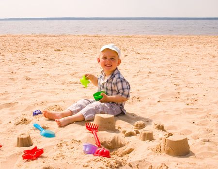 Little boy on a beach の写真素材