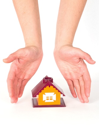 Hands and little houseの写真素材