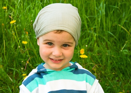 Portrait of a little boy in the park の写真素材