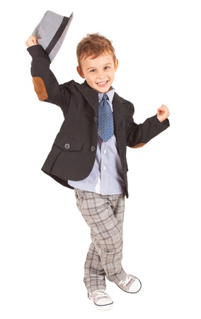 Greeting cool pretty stylish little boy isolated on white backgroundの写真素材