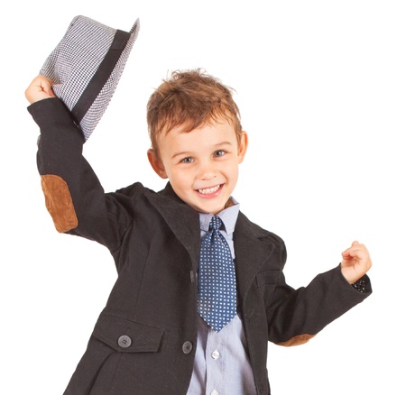 Greeting cool pretty stylish little boy isolated on white background の写真素材