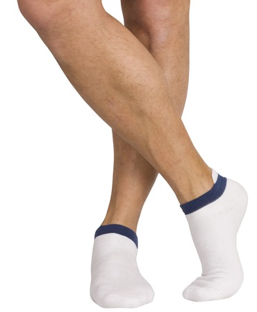 Male legs in socks  Isolated on white の写真素材