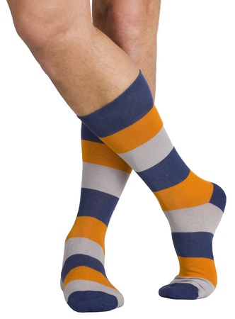 Male legs in socks. Isolated on white backgroundの写真素材