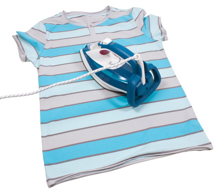 Electric iron and shirt. Isolated on white backgroundの写真素材
