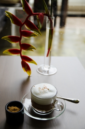 cappuccino cup on the wooden tableの写真素材