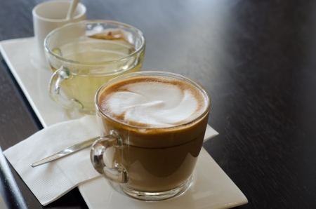 cappuccino with hot tea and sugarの写真素材