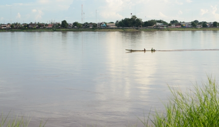 the row boat in the middle of Khong riverのeditorial素材
