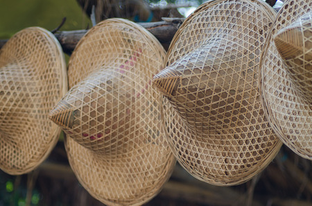 Asian conical weave hat with leaves dryの写真素材