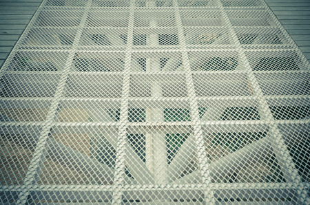 walk way make from metal grid with regular pattern