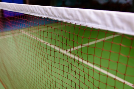 net and green floor badminton courtの写真素材