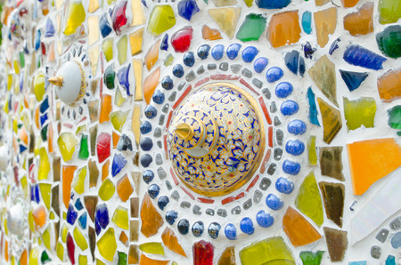 Thai Benjarong bowl on tile mosaic background,Thailandの写真素材