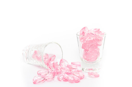 many pink crystal hearts glass isolated on white backgroundの写真素材